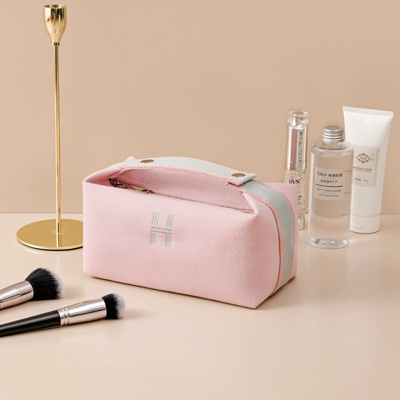 Portable premium canvas makeup bag, large capacity, washable, stylish storage for women